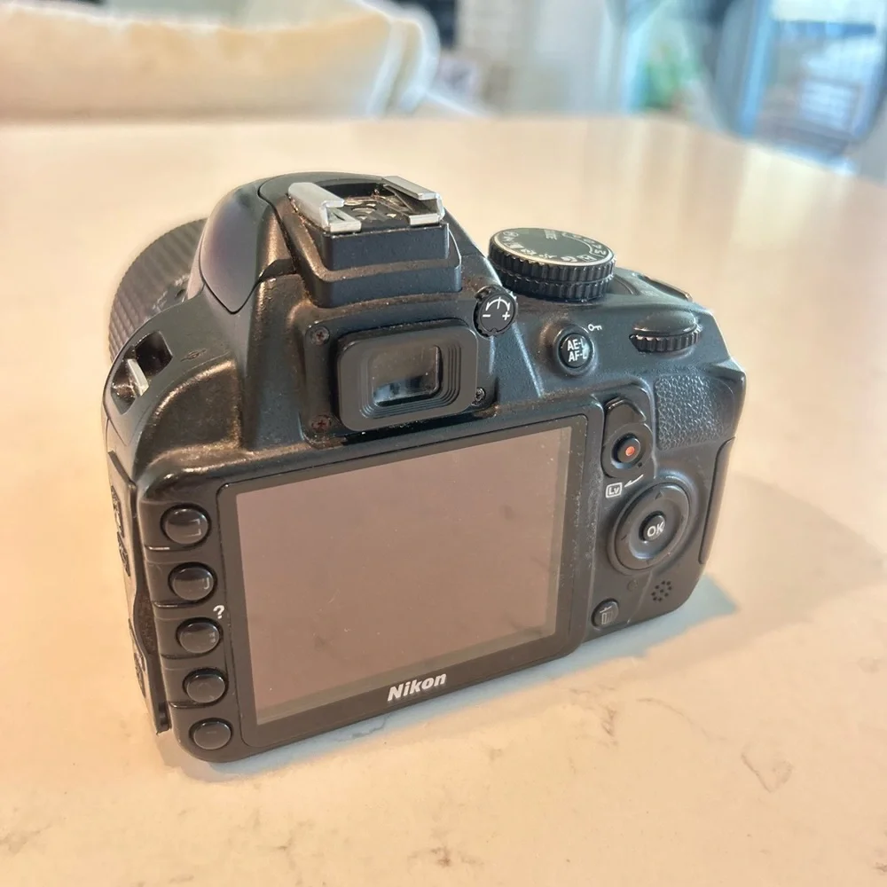 Nikon D3100 DSLR Camera with 55-200mm lens